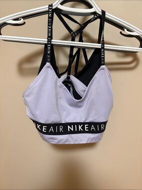 3 Nike sports bras: Lavender, Black, orange sports bras